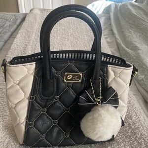 Cream and Black Mini Satchel. Never used.Perfect condition. No scuffs or marks